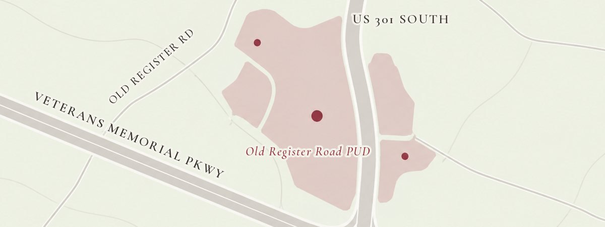 Illustration: A large planned development beside a highway junction.